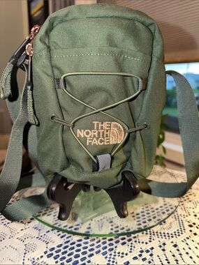 The North Face Olive Green Mini Crossbody Belt Bag with Bungee